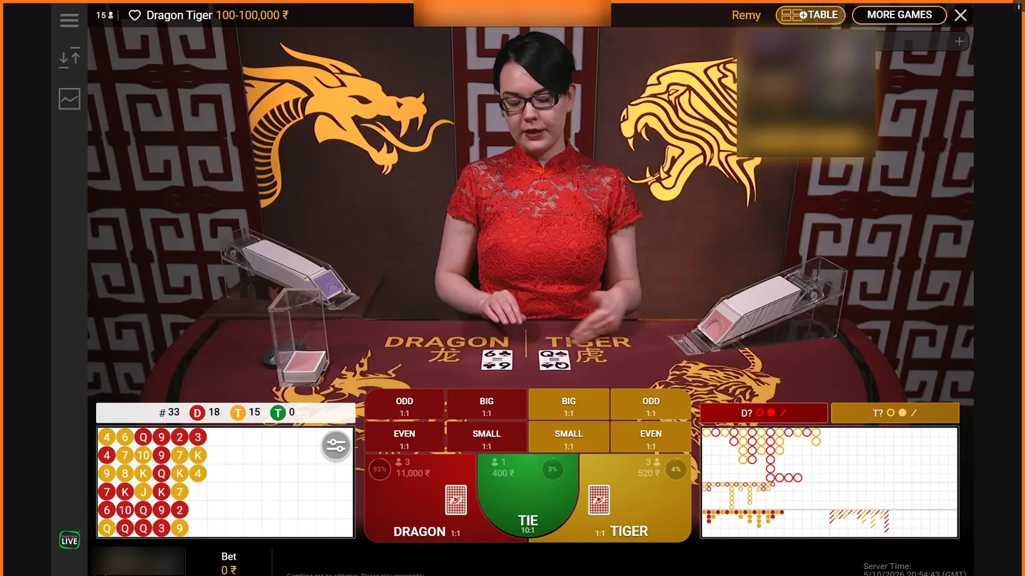 Playtech live Dragon Tiger table at Melbet with limits from ₹100 to ₹1,00,000: Dragon 6 against Tiger Queen, Tie paying 10:1 and Odd, Even, Big and Small side bets for each side